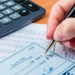 Checking Account: Necessities or Spending Spree? How Much Money Should I Keep in My Checking Account?